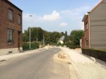 Afwerking eerste deel Isabellastraat. Hier enkel voetpaden (wegens beperkte ruimte) en snelheidsremmers.