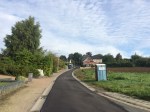 De Lostraat in Schepdaal kreeg een nieuwe slijtlaag waardoor de straat volledig in topstaat is